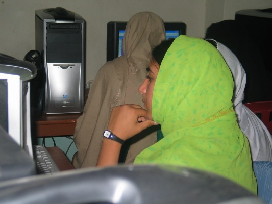 An ACCC student studies on the computer.
