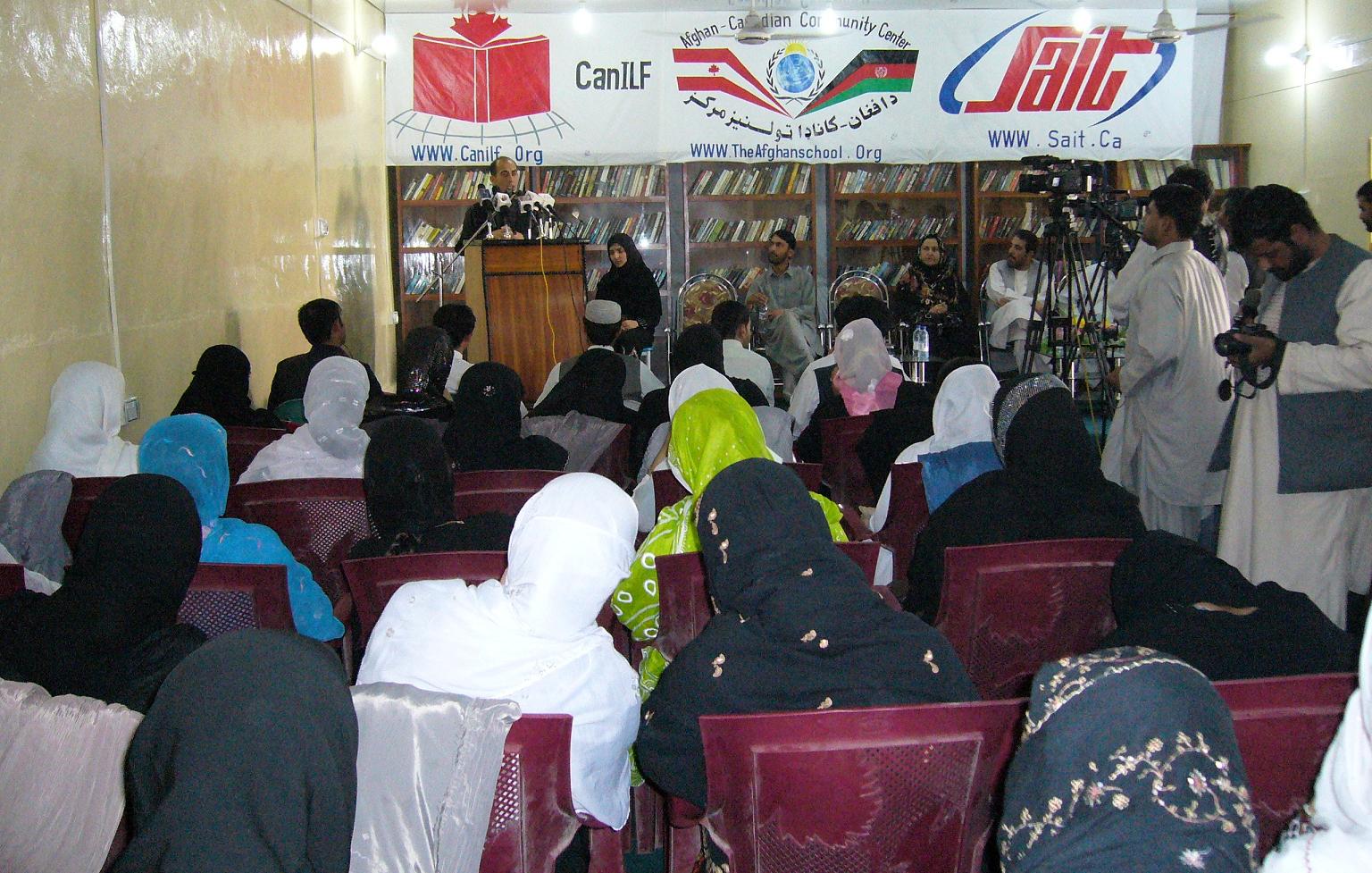 ACCC Director Ehsanullah Ehsan addresses guests during the graduation