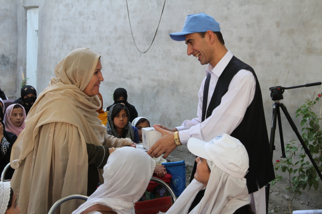 A School Principal Receives Gift from Ehsan
